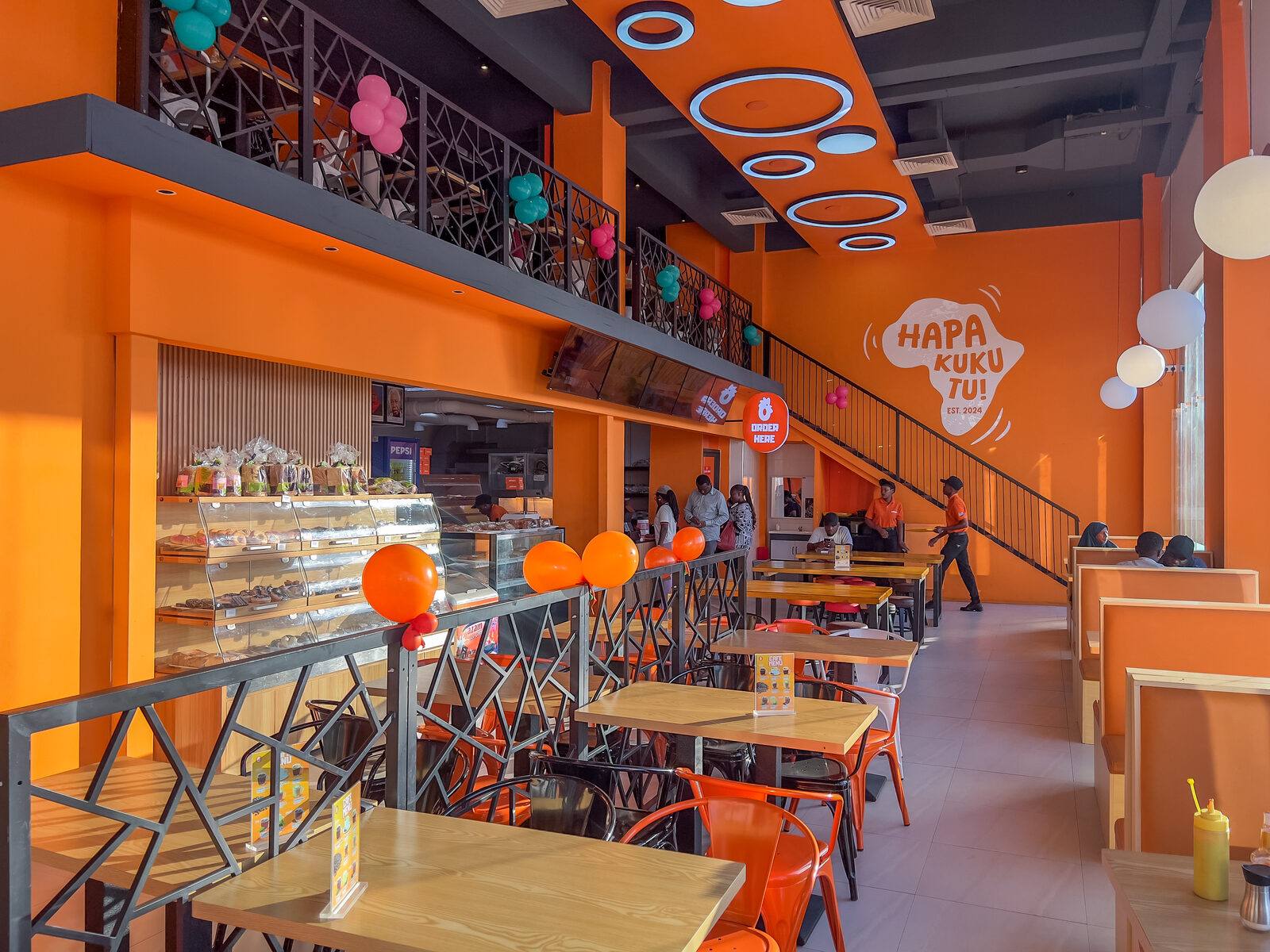 Kookoos GSM interior with Hapa Kuku Tu wall art